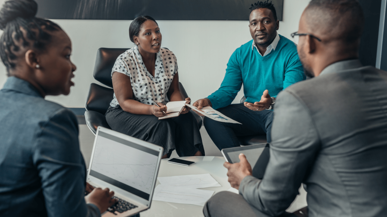 Grant writing assistance for researchers reviewing proposal documents together