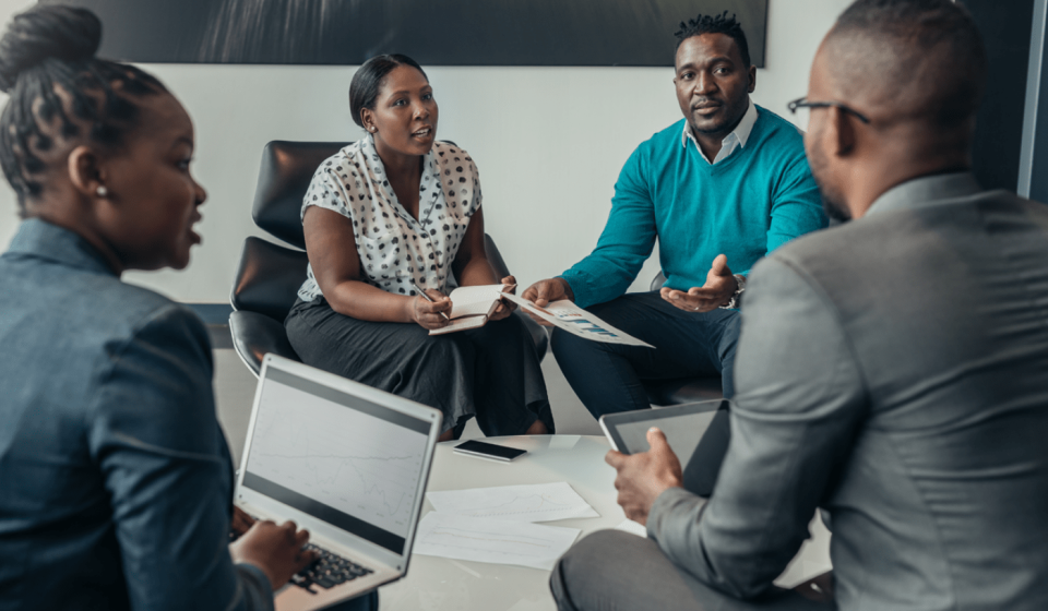 Grant writing assistance for researchers reviewing proposal documents together